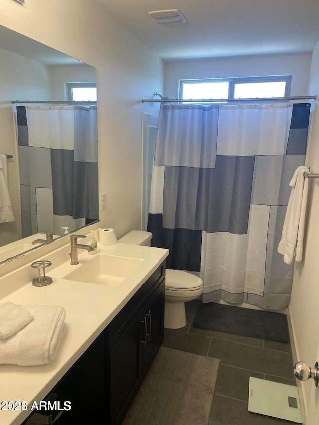 2364 N 212th Ave, Buckeye, AZ 85396 - bathroom featuring toilet, vanity, tile patterned flooring, and a shower with shower curtain