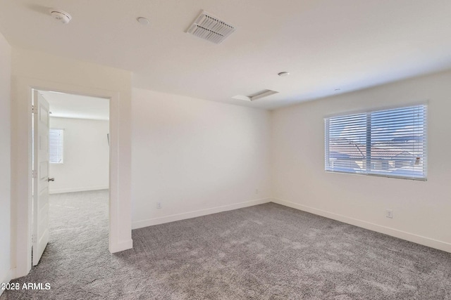 2364 N 212th Ave, Buckeye, AZ 85396 - carpeted spare room with baseboards and a smoke detector