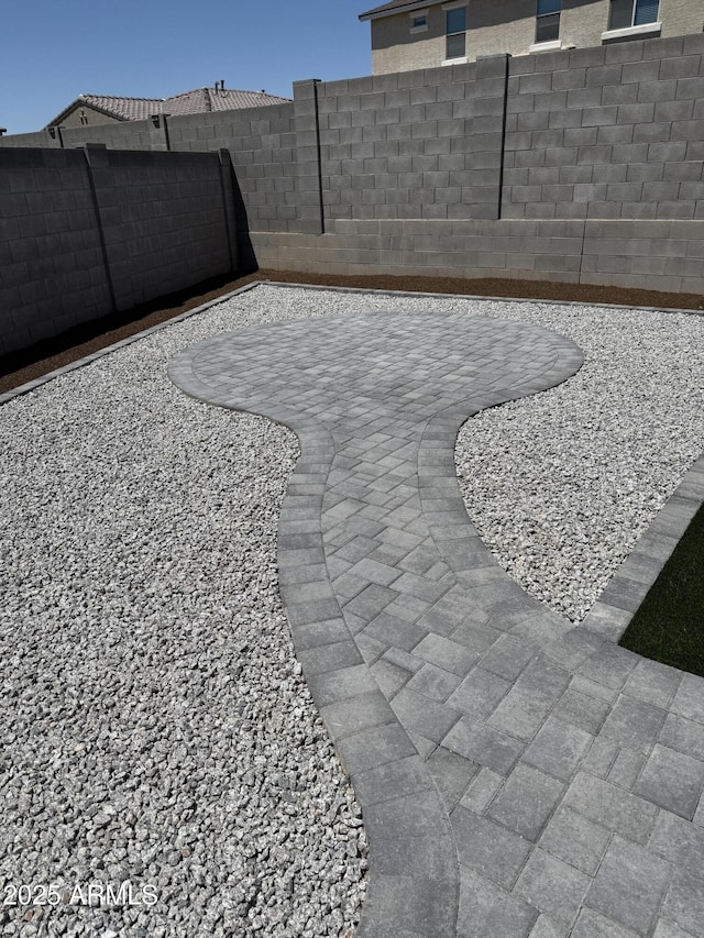 2364 N 212th Ave, Buckeye, AZ 85396 - fenced backyard with a patio