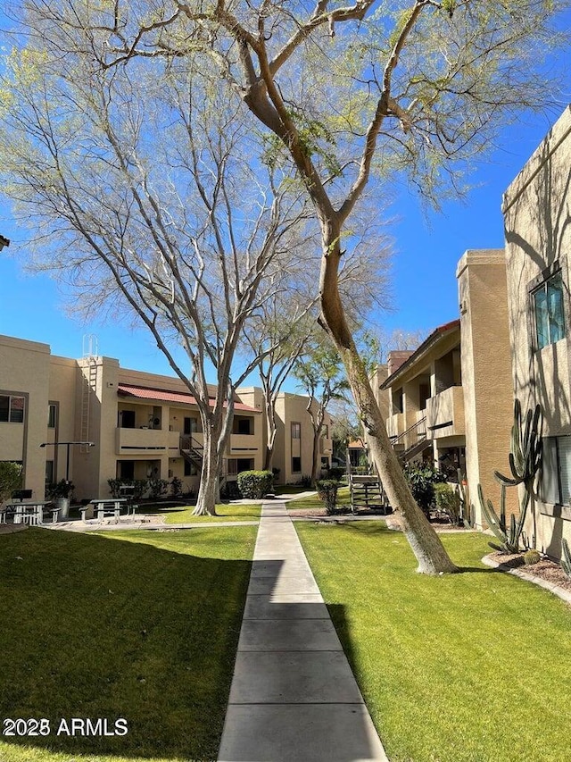 145 N 74th St Unit 125, Mesa, AZ 85207 - surrounding community featuring a residential view and a lawn