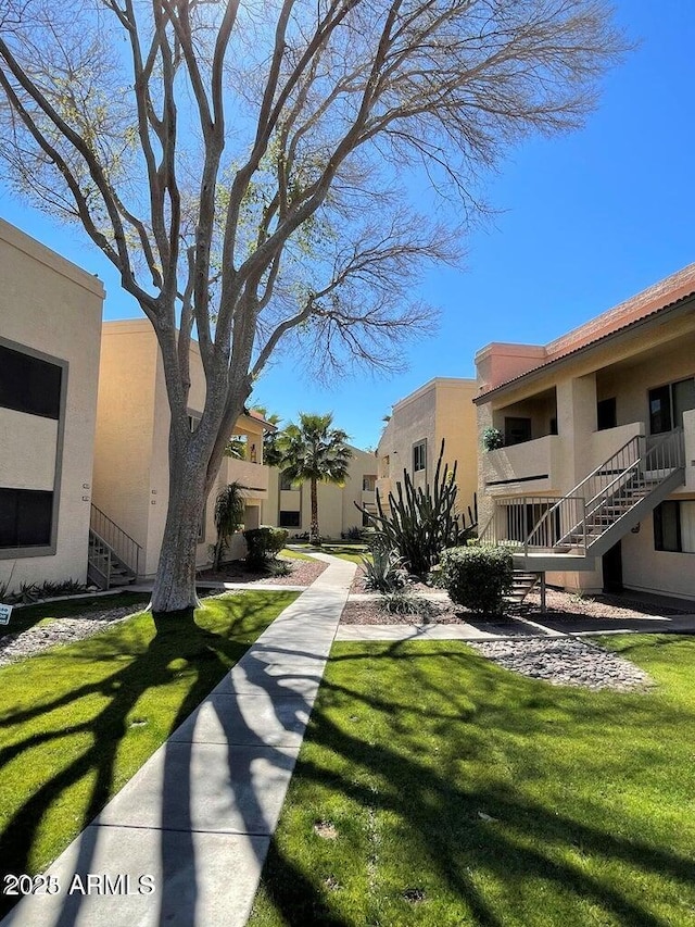 145 N 74th St Unit 125, Mesa, AZ 85207 - surrounding community with a lawn and a residential view