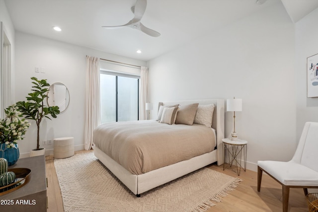 bedroom featuring ceiling fan and light wood-type flooring