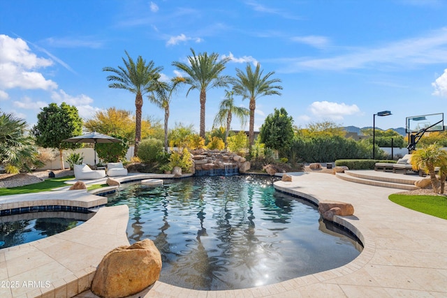 view of swimming pool featuring a patio