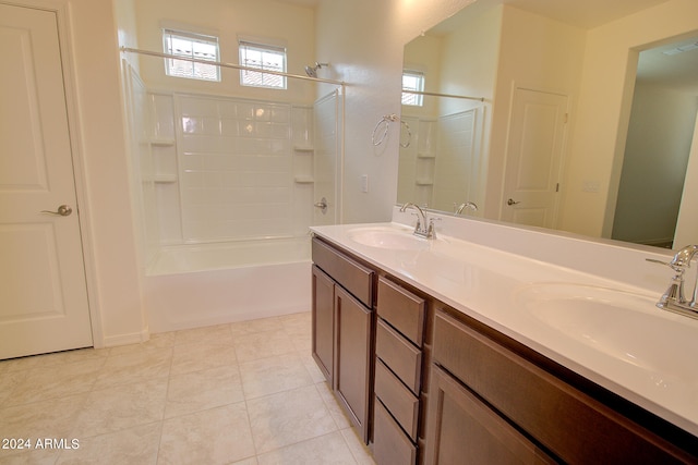 bathroom with bathtub / shower combination, tile patterned flooring, and double sink vanity