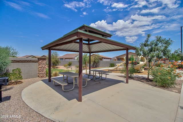 view of patio / terrace featuring a gazebo and a playground