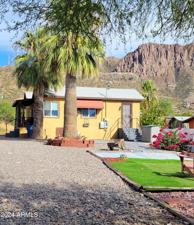 225 N Lobb Ave, Superior, AZ 85173 - rear view of property with a mountain view and stucco siding