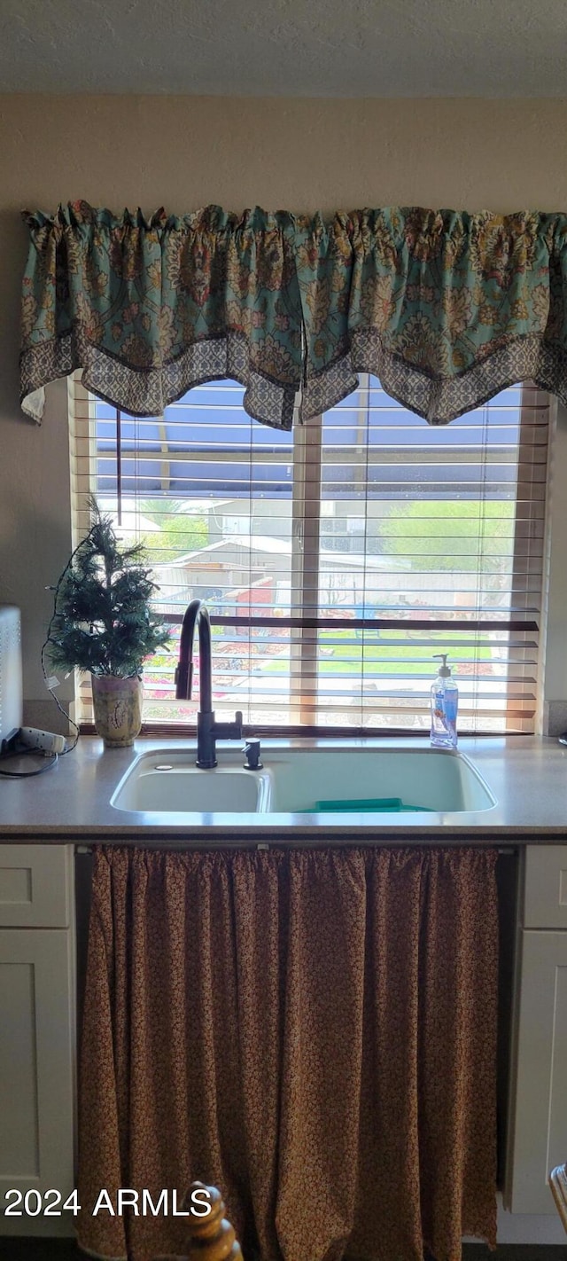 kitchen with white cabinetry