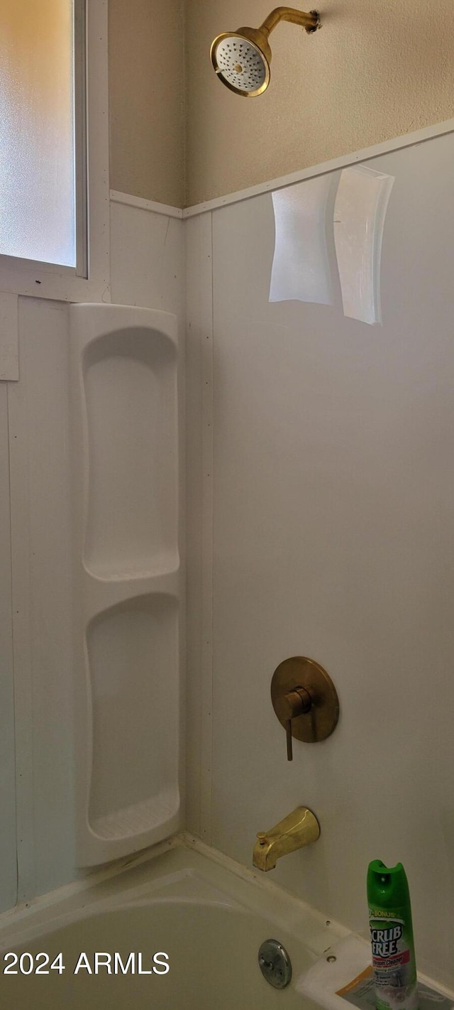 bathroom featuring a washtub