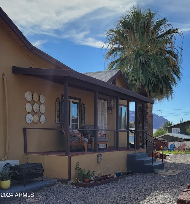 225 N Lobb Ave, Superior, AZ 85173 - exterior space featuring a porch and stucco siding