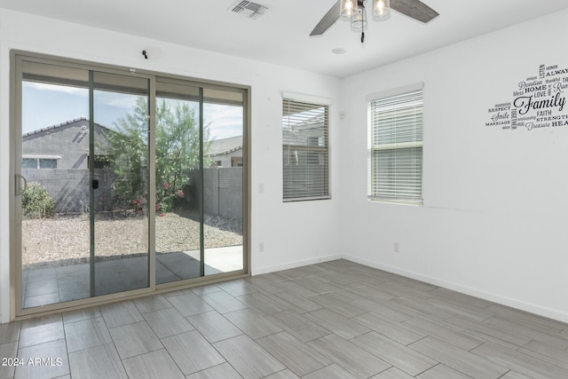 unfurnished room featuring ceiling fan