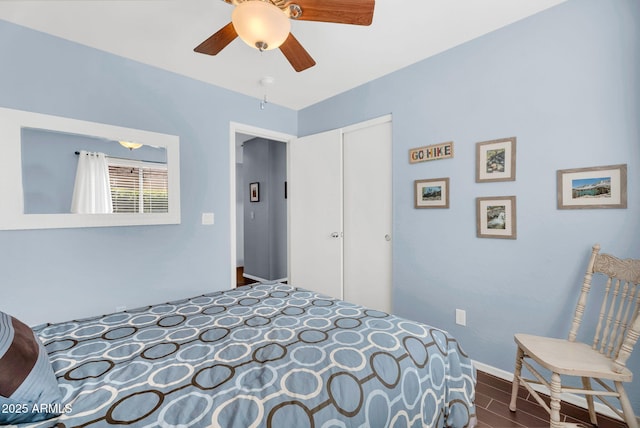 bedroom featuring a closet and a ceiling fan