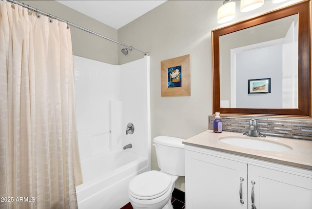 bathroom featuring toilet, tasteful backsplash, vanity, and shower / tub combo with curtain