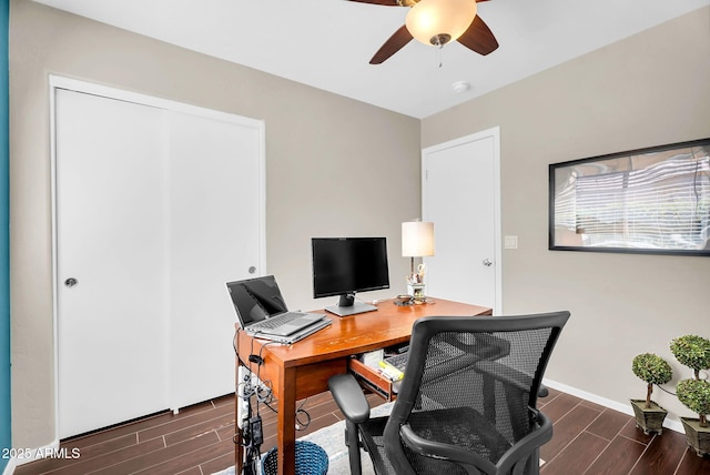 office featuring wood tiled floors and ceiling fan