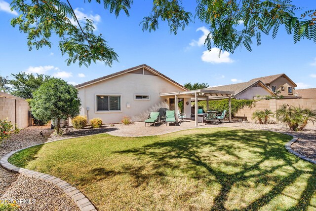 back of property featuring stucco siding and a patio