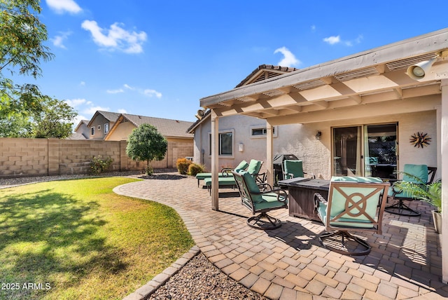 view of patio featuring a pergola and a fire pit