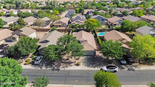 aerial view of residential area featuring a pool area