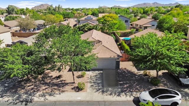 aerial perspective of suburban area with a mountain backdrop