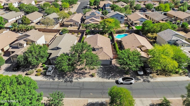 aerial perspective of suburban area with a pool