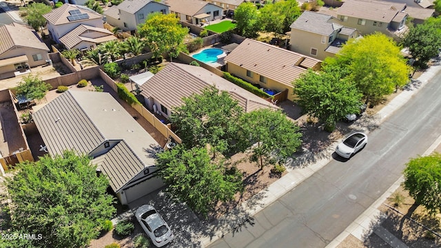 aerial view of residential area with a pool area
