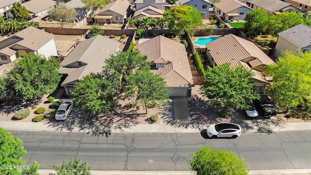 aerial perspective of suburban area with a pool area