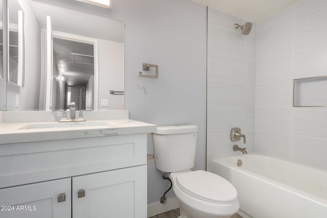 4302 N 80th Ln, Phoenix, AZ 85033 - full bathroom featuring toilet, bathtub / shower combination, and vanity
