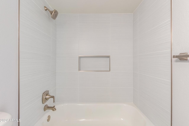 4302 N 80th Ln, Phoenix, AZ 85033 - bathroom with tub / shower combination and toilet