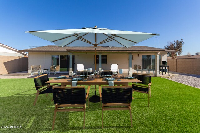 4302 N 80th Ln, Phoenix, AZ 85033 - back of house featuring a patio