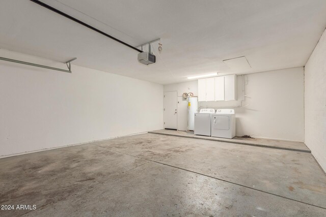 4302 N 80th Ln, Phoenix, AZ 85033 - garage featuring washing machine and dryer, water heater, and a garage door opener