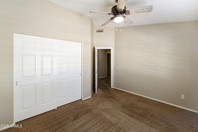 unfurnished bedroom with carpet, visible vents, a ceiling fan, and baseboards