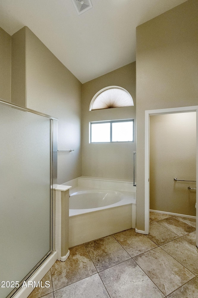 bathroom with a bath, visible vents, tile patterned flooring, and a stall shower