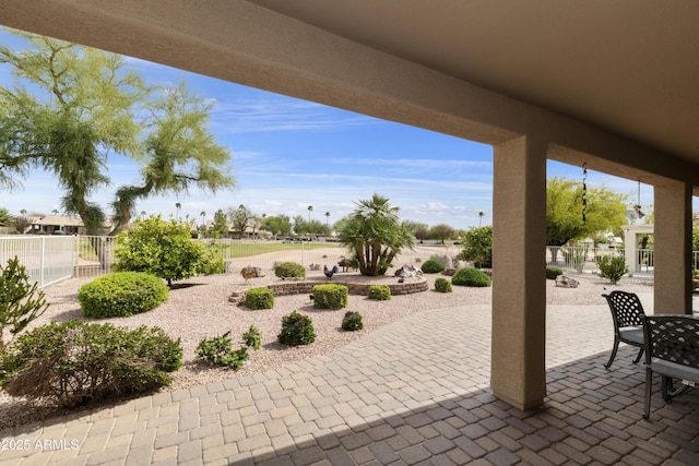 view of patio with fence
