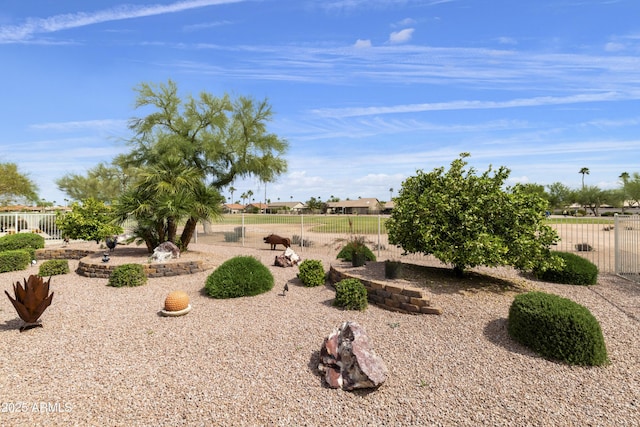 view of yard with fence