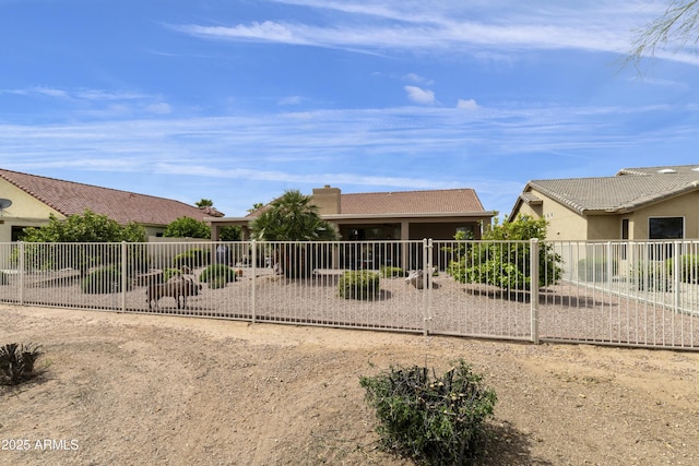 exterior space featuring fence and stucco siding