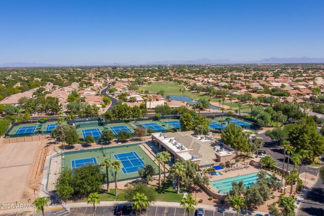 birds eye view of property with a residential view and a water and mountain view