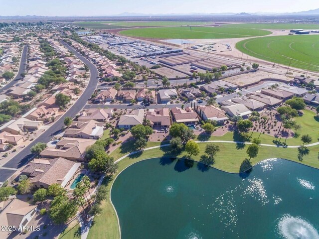 aerial view with a water view and a residential view
