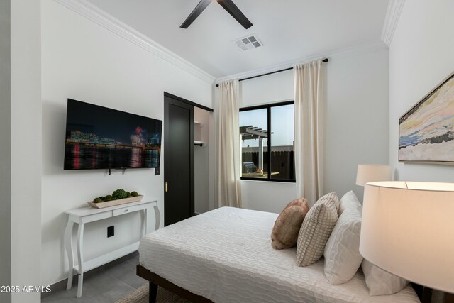 bedroom featuring a ceiling fan, baseboards, visible vents, and crown molding