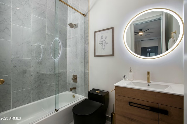 full bathroom with shower / bath combination with glass door, vanity, and toilet