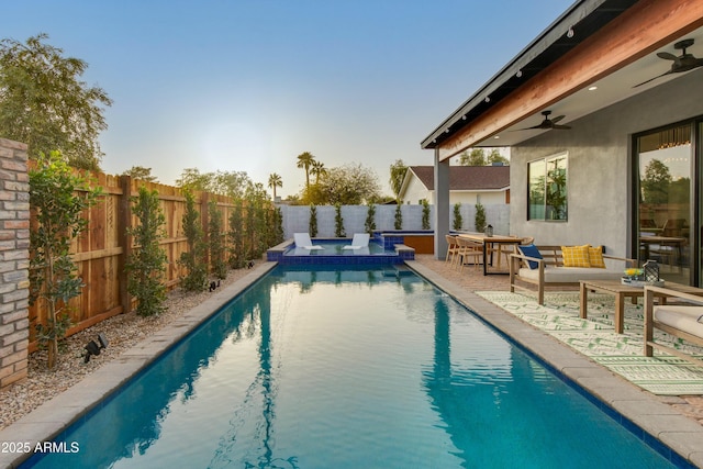 view of swimming pool with a fenced in pool, a patio, an outdoor hangout area, ceiling fan, and a fenced backyard