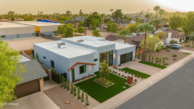 aerial view at dusk with a residential view