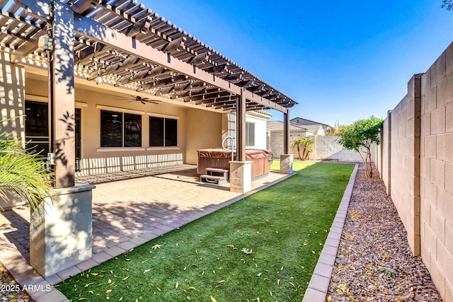 view of yard with a pergola, a hot tub, a fenced backyard, ceiling fan, and a patio area