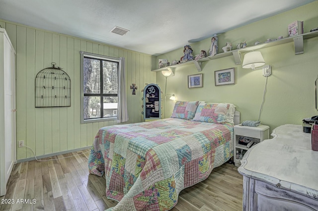 bedroom with light wood-type flooring