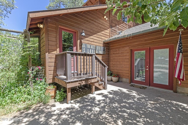 view of home's exterior featuring a patio and french doors