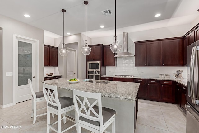 1036 W Siebold Tree Ave, Queen Creek, AZ 85140 - kitchen with wall chimney range hood, stainless steel appliances, a sink, light tile patterned floors, and recessed lighting