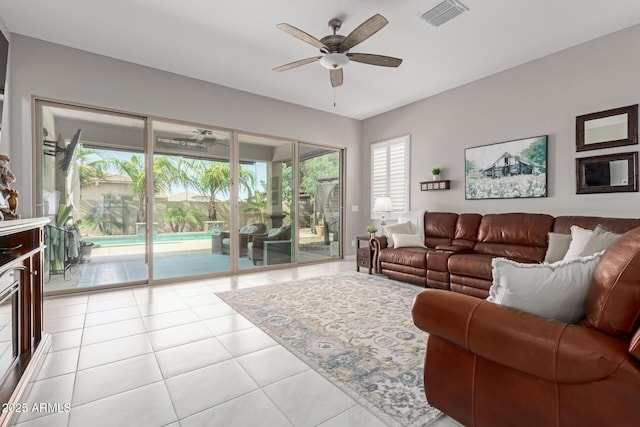 1036 W Siebold Tree Ave, Queen Creek, AZ 85140 - living area with a ceiling fan and light tile patterned floors