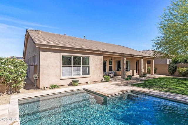 5813 E Ashler Hills Dr, Cave Creek, AZ 85331 - back of house with stucco siding, fence, a patio, and a fenced in pool