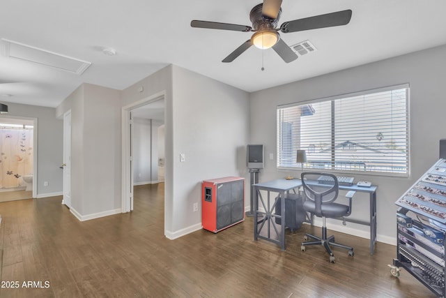 office with wood finished floors, visible vents, and baseboards