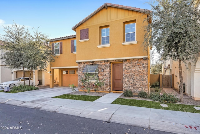 view of front of property with a garage