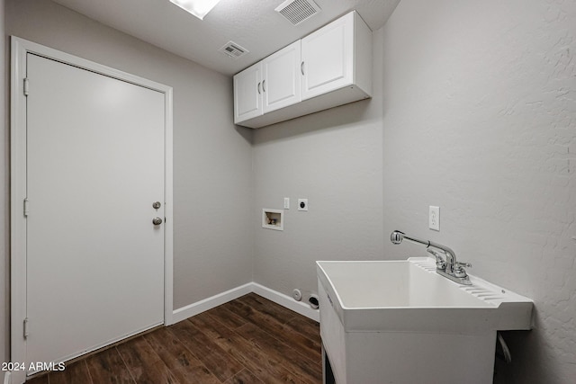 laundry room with electric dryer hookup, cabinets, sink, hookup for a washing machine, and dark hardwood / wood-style flooring