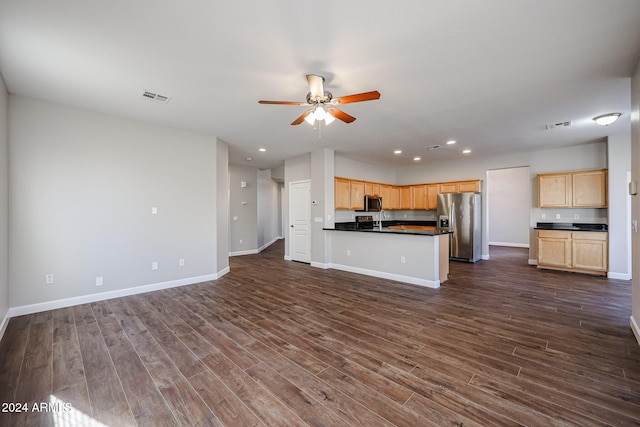 kitchen with light brown cabinetry, ceiling fan, dark hardwood / wood-style flooring, and stainless steel refrigerator with ice dispenser