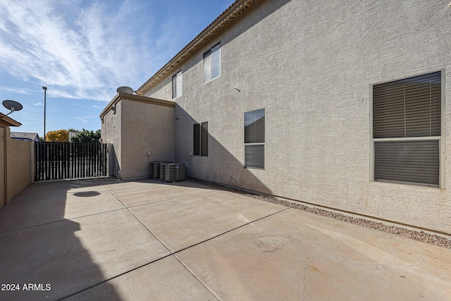 view of home's exterior featuring a patio area and central air condition unit